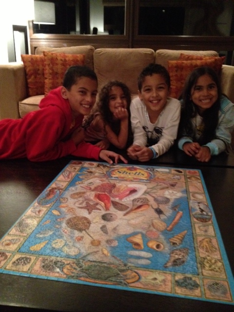 Kids with 1,000 piece puzzle